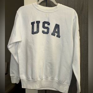 White USA sweater.